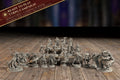 Group photo of all 20 painted-ready miniatures from the The Arcane University campaign bundle, with a Ready to Play banner listing miniatures, campaign book, character sheets, and battle sheets.