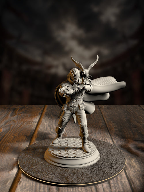 Gunslinger miniature mid-draw with a raised revolver, wide-brimmed hat blown back, a crow perched on his shoulder