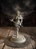 Elegant noblewoman duellist miniature mid-flourish with a drawn rapier, wearing an ornate corseted dress and flowing cape