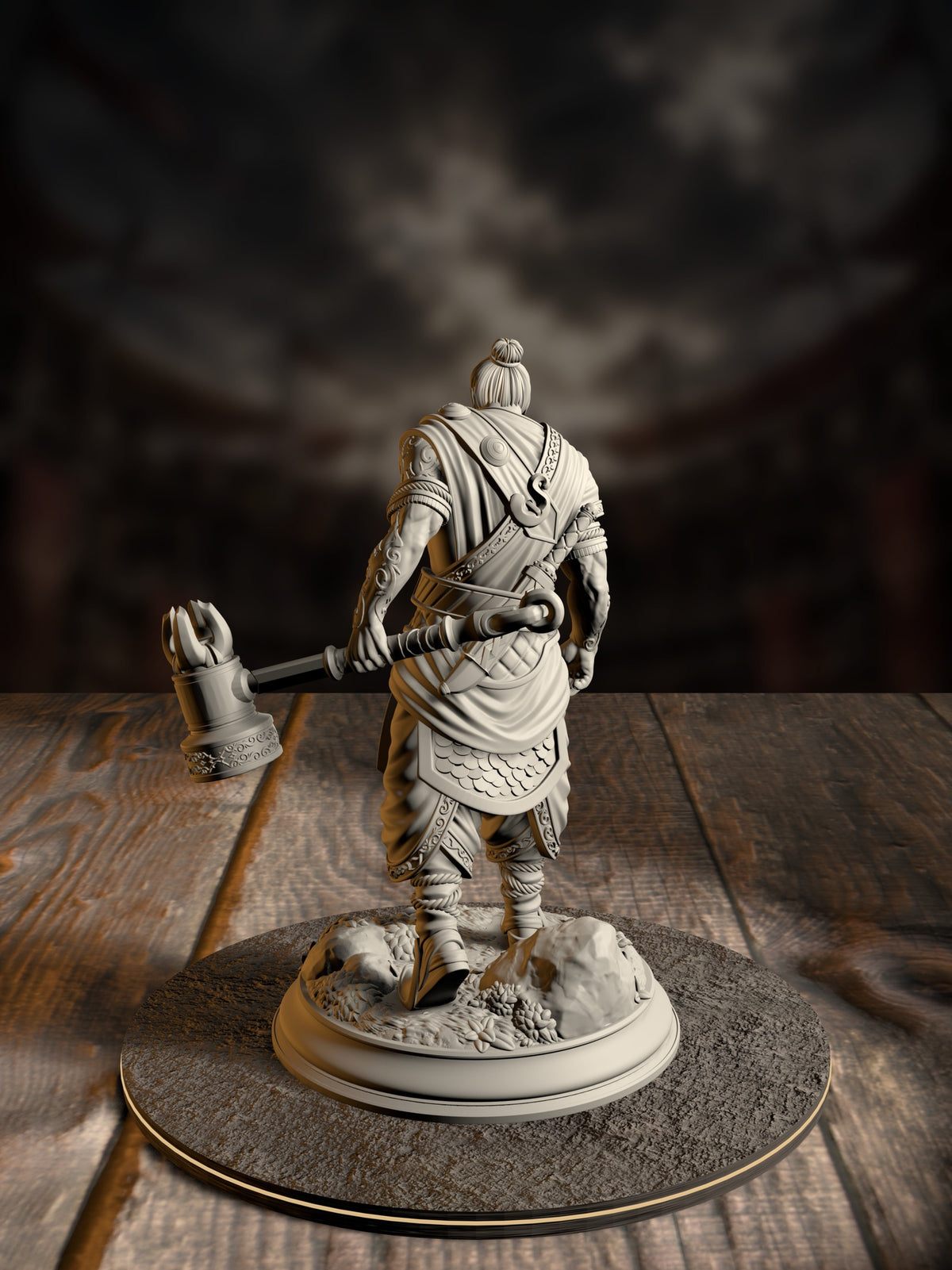 Rear view of Sindan the Southern Hammer miniature showing his topknot, layered wrap armor, and hammer follow-through
